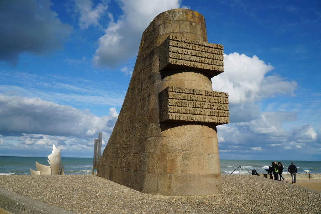 A stone memorial at Omaha beach commemorating D-Day.